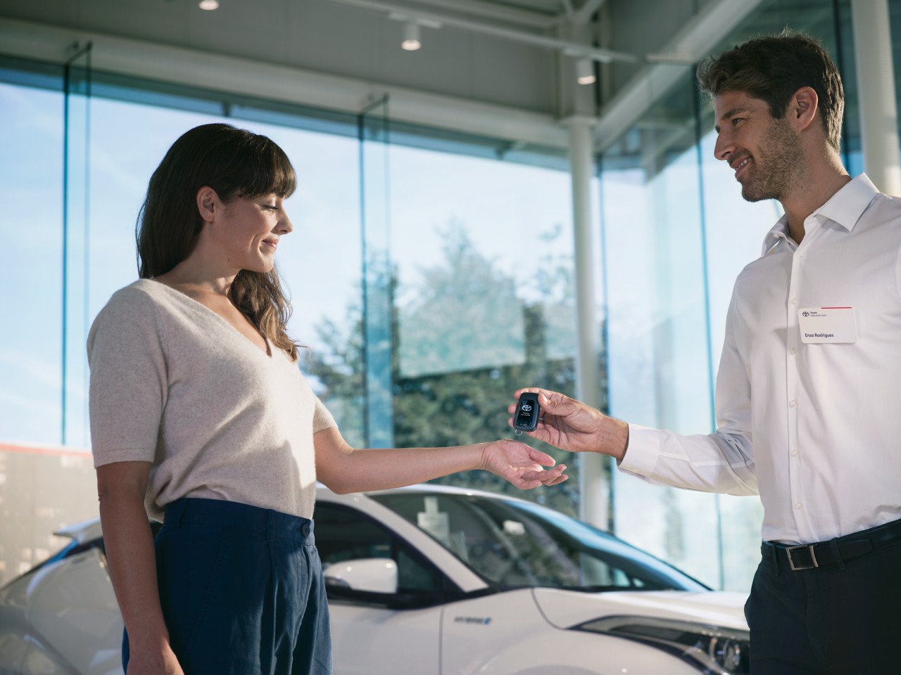 Toyota customer receiving car keys